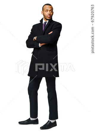 full length studio shot of a african-american businessman wearing coat Isolated on white background full length studio shot of a african-american businessman wearing coat Isolated on white background 67920763