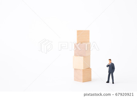 Building block and businessman 67920921