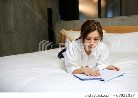 open book studying on the bed open book studying on the bed 67921037