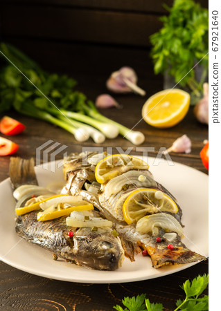 Cooked river fish carassius Cooked river fish carassius 67921640