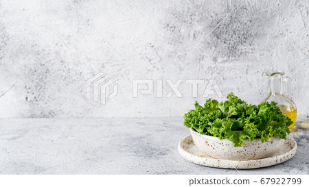 Kale leaves in bowl, copy space left 67922799
