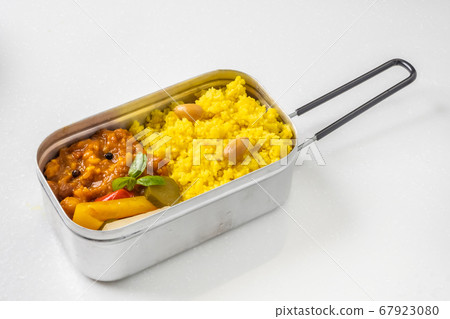 Curry with chickpeas and couscous 67923080