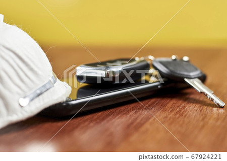 Car keys, smartphone and n95 face mask respirator Car keys, smartphone and n95 face mask respirator 67924221