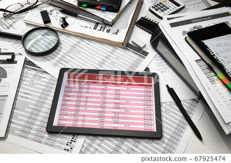 business office desk closeup - tablet computer 67925474