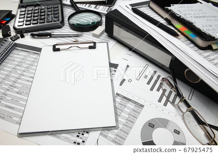 business office desk closeup - financial reports, business office desk closeup - financial reports, 67925475
