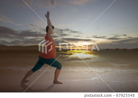Asian pregnant woman is practicing yoga Asian pregnant woman is practicing yoga 67925548