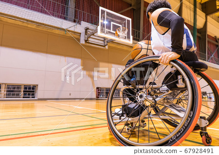 Man playing wheelchair basketball 3 67928491