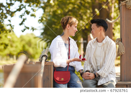 Woman making proposal 67928761