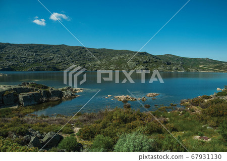 Blue fresh water at the Long Lake on highlands Blue fresh water at the Long Lake on highlands 67931130