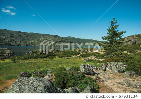 Hilly landscape with the Long Lake on highlands 67931134
