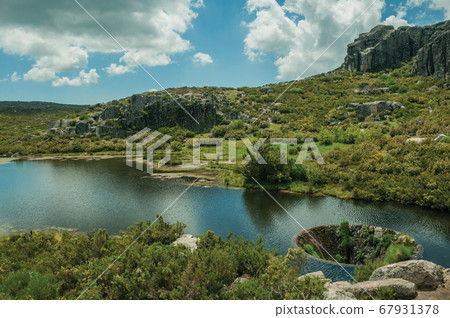 Large sinkhole in a dam lake on the highlands Large sinkhole in a dam lake on the highlands 67931378