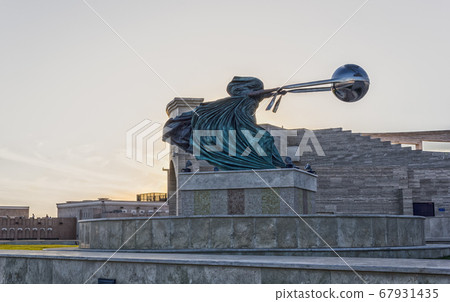 Katara Cultural village Doha, Qatar  with Force of Nature 2 statue in foreground and the Amphitheater in the background 67931435