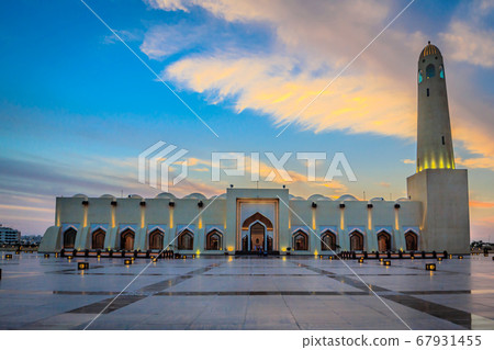 Qatar State Mosque (Imam Muhammad ibn Abd al-Wahhab Mosque)  exterior view at sunset with clouds in the sky 67931455