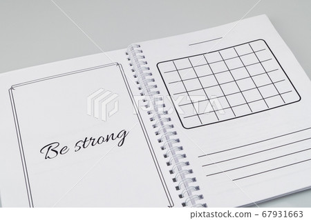 notepad on a white background notepad on a white background 67931663
