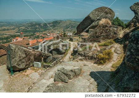 Pathway passing through big rocks in Monsanto 67932272