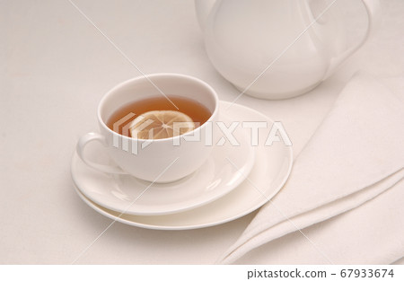 tea saucer cup and napkin 67933674