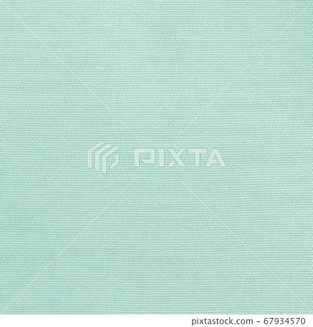 Cotton linen fabric textile woven textured backdrop in pastel light green blue mint color Cotton linen fabric textile woven textured backdrop in pastel light green blue mint color 67934570