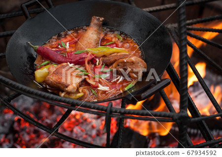 cooking on fire cooking on fire 67934592