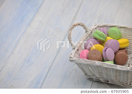 colorful cookies in a basket 67935905