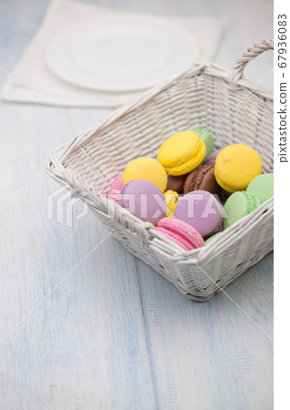 colorful cookies in a basket 67936083