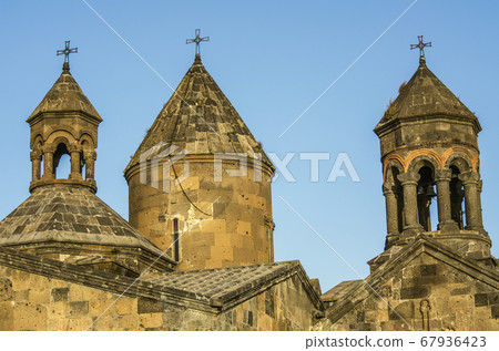 The roof of Sagmosavank monastery with two bell towers and an umbrella roof The roof of Sagmosavank monastery with two bell towers and an umbrella roof 67936423