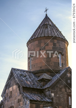 The large dome of the Ssagmosavank monastery, standing on the edge of a precipice near the city of Ashtarak 67936424