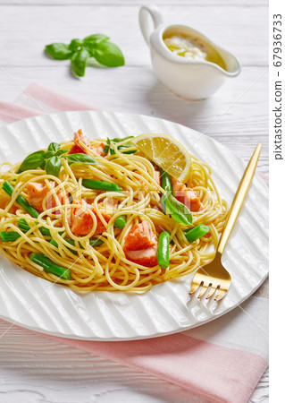Salmon pasta with green beans and butter sauce 67936733