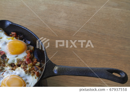 Food background, fried eggs with vegetables in 67937558