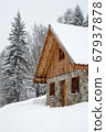 Chalet in winter 67937878