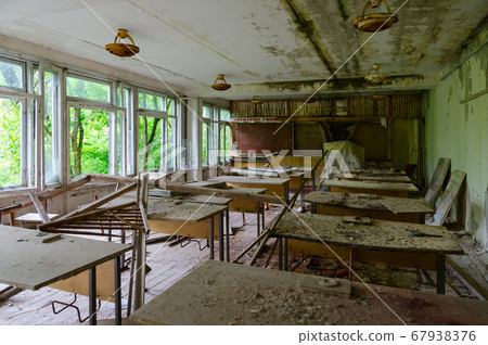 Devastation in premises of abandoned school in exclusion zone of Chernobyl nuclear power plant 67938376