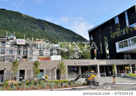 Norway Vos Station on the Norwegian Railway Bergen Line Connected with Voss Gondola Station Red gondola shining in the green mountains 67938419