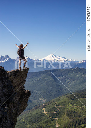 Girl hiking in Canadian Mountains 67938774