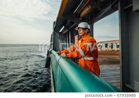 Filipino deck Officer on deck of vessel or ship 67938980