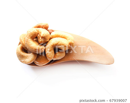 Wooden spoon with Dried cashew nuts Wooden spoon with Dried cashew nuts 67939007
