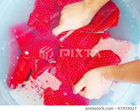 Asian thai woman use hands to washing and cleaning Asian thai woman use hands to washing and cleaning 67939027