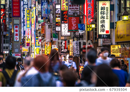 Tokyo cityscape in Japan Shinjuku, Kabukicho, masks stand out (back is Ichibangai, theater street) = July 29 Tokyo cityscape in Japan Shinjuku, Kabukicho, masks stand out (back is Ichibangai, theater street) = July 29 67939304