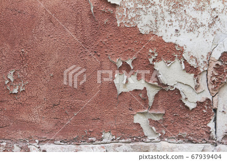 Old flaky cracked paint on gray wall, old paint Old flaky cracked paint on gray wall, old paint 67939404