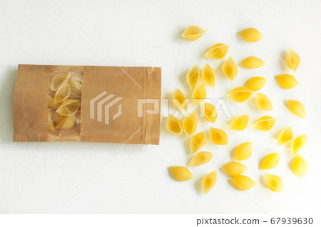 Pouch bag with pasta flatlay, top view. Packaging Pouch bag with pasta flatlay, top view. Packaging 67939630