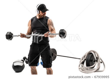 Aggressive bearded strong muscular Man in sportswear workout with barbell on white isolate Aggressive bearded strong muscular Man in sportswear workout with barbell on white isolate 67939995