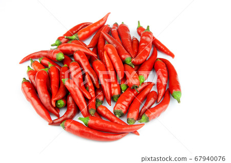 Small Red Chilli Peppers on White Background Small Red Chilli Peppers on White Background 67940076