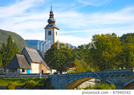 Bohinj Lake, Church of St John the Baptist with Bohinj Lake, Church of St John the Baptist with 67940582
