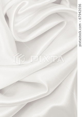 Smooth elegant golden silk or satin luxury cloth Smooth elegant golden silk or satin luxury cloth 67942036