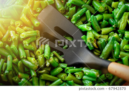 Juicy green string beans close-up. Background. Diet food or healthy vegetable side dish 67942870