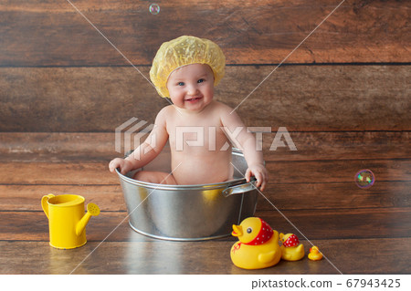 Bath time photo shoot.  67943425