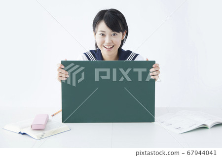 Junior high school girls with message board Junior high school girls with message board 67944041