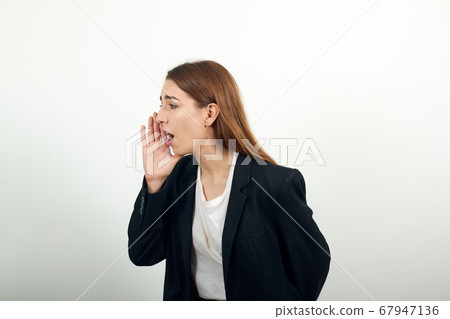 Scream and shout Holding hands near opened mouth. Screaming loudly with hand 67947136