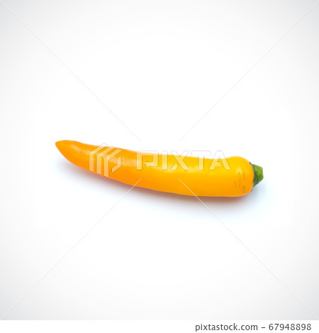 Yellow hot chili pepper isolated on the white 67948898