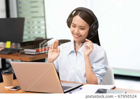 Asian Startup business woman meeting with video Conference in office. Asian Startup business woman meeting with video Conference in office. 67950524
