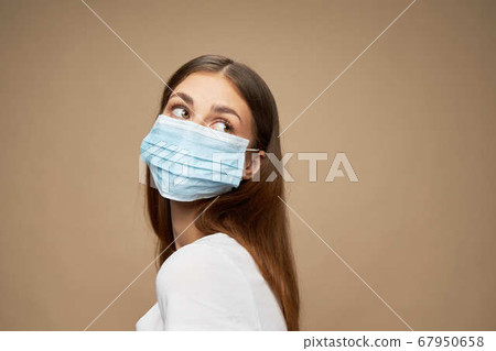 Model fashion clothes in a medical mask health  67950658