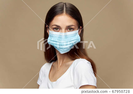 Girl stylish clothes in a protective mask Girl stylish clothes in a protective mask 67950728
